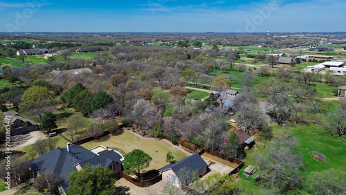 Canvas Print Dense tree cover surrounds custom acreage homes within Oak Trail subdivision