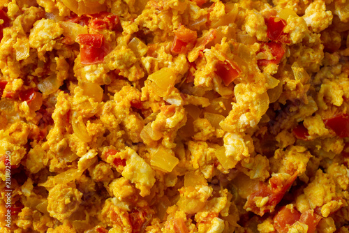 Foto A top down view of a pile of Yemeni shakshuka, as a background.
