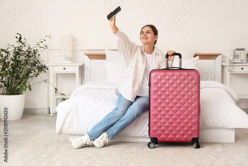 Young woman taking a selfie...