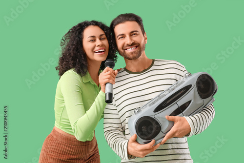 Young couple with microphon...