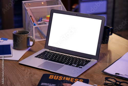 Blank laptop with stationer...