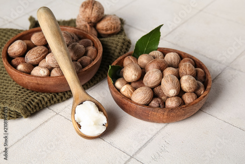 Spoon of shea butter and nu...