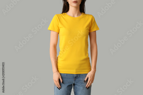 Young woman in stylish yell...