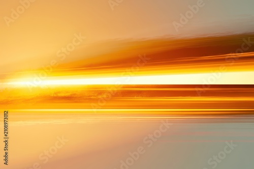Abstract golden sunset light streaks and motion blur landscape