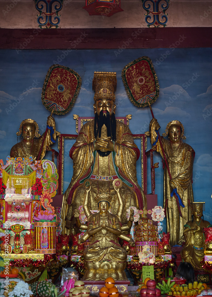 Fototapeta premium Statue of Tian Gong (Jade Emperor) at a traditional Chinese Taoist temple altar