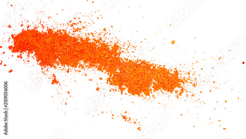 Bild auf Leinwand Vivid orange pigment powder heap on textured paper in white background, transpar