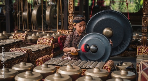 gamelan musician playing traditional instrument