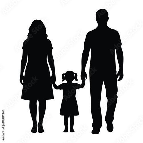 Silhouette of parents holding hands with a little girl