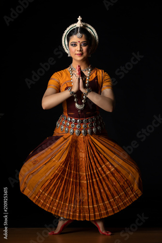 Odissi dancer performing Namaste pose