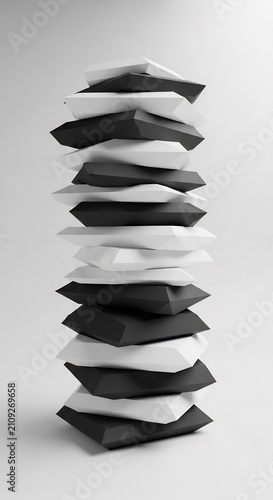 Stack of Black and White Pillows on a White Background.