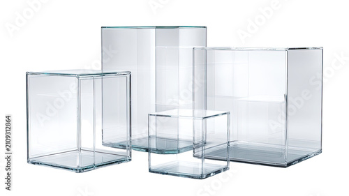 transparent glass cube display boxes and empty acrylic rectangular containers arranged in modern geometric composition for product showcase isolated on white background 