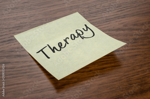 Sticky note with the text Therapy