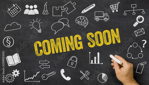 Coming Soon written on a blackboard with icons