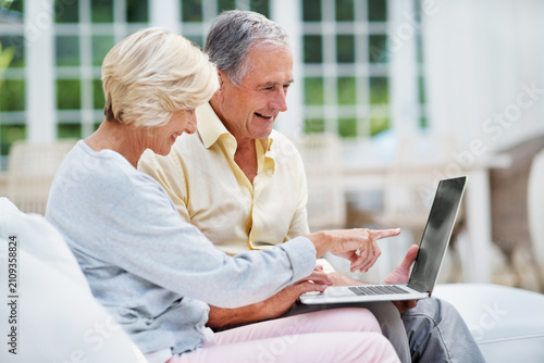 Schilderij op canvas Senior, couple and research on laptop in home for pension payment date, verify eligibility and love
