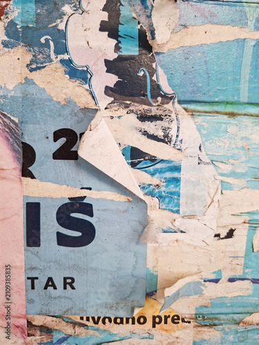 Torn and ripped urban textured paper poster grungy background
