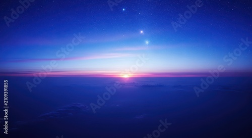 A breathtaking view of the deep blue evening sky showing layers of distant clouds and infinite cosmic space with glowing celestial light, blue, celestial, outer