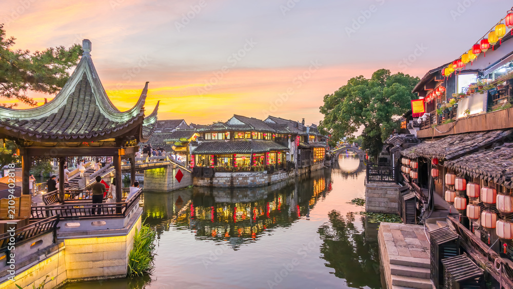 Obraz premium Sunset view of Xitang ancient water town in Jiashan County, Zhejiang, China