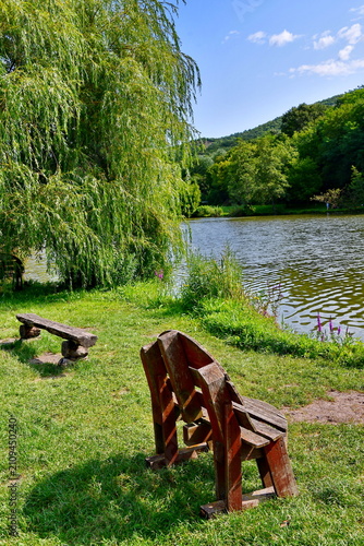 Wooden bench on the lake