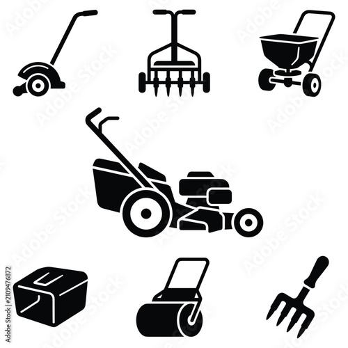 Cuadro en lienzo Lawn care equipment set with lawn mower aerator spreader and garden fork