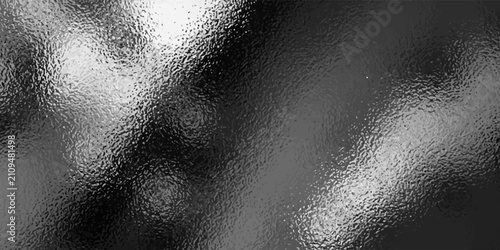 Premium silver hammered metal texture background featuring a realistic foil effect with intricate light-reflective dimples