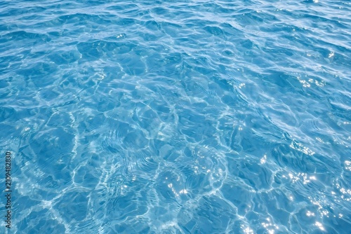 Clear blue ocean surface ripples abstract