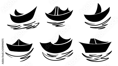 Quadro su tela Minimalist set of hand-drawn boat silhouettes isolated on a  transparent background, featuring stylized paper ships and sailboats floating on hand-sketched waves