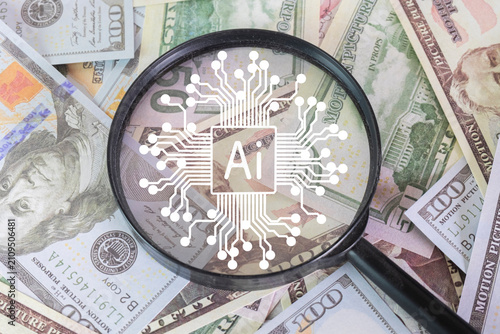 Artificial intelligence in finance and fintech concept. Magnifying glass with a white AI microchip graphic resting on a pile of US dollar bills for smart investment analysis.