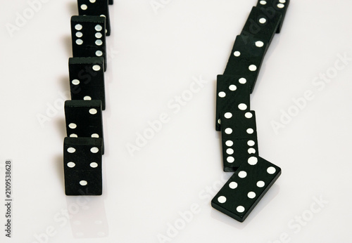 two rows of  dominoes on white background