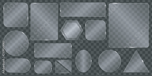 Collection of glass shapes and transparent frames with reflections on a transparent background