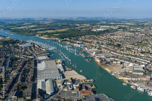 Photography Aerial photo overlooking the River Medina in Cowes on the Isle of Wight showing