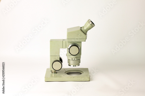 Canvastavla Stereo inspection microscope with single eyepiece and adjustable focus, isolated on a white background