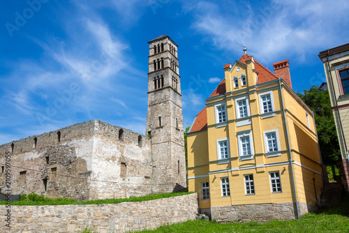 Canvastavla Ruins of Saint Marys Church and Saint Luke Bell Tower next to historical yellow