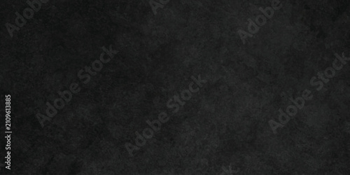 Dark texture chalk board and grunge black board background. Dark charcoal grunge wall texture background. Dark black rough grunge surface with smoke edge.