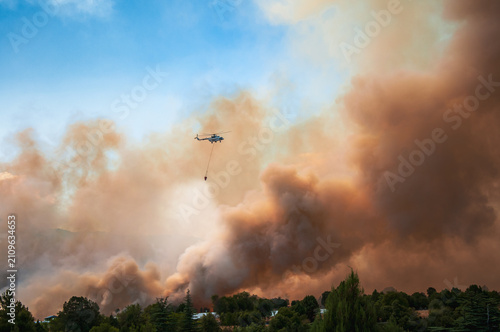 Photography A helicopter responding to a forest fire.