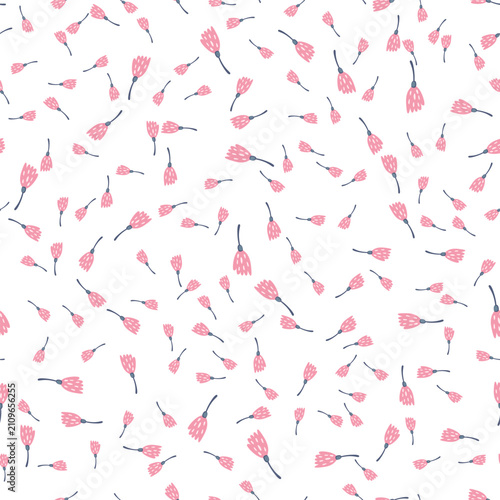 Scattered pink floral blossoms on white background - seamless vector pattern....
