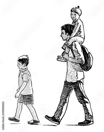 A man with his kid is strolling