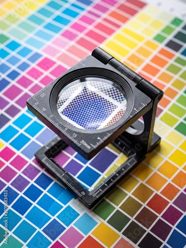 Magnifying Glass on CMYK Color Test Chart