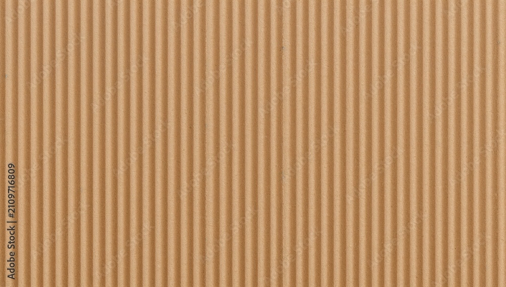 Fototapeta premium Textured Cardboard Material with Vertical Ridges in Warm Beige Tone