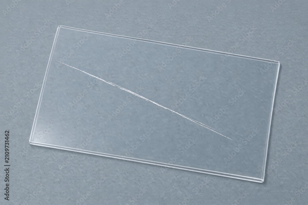 Fototapeta premium A piece of transparent plastic resting on a table