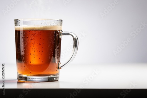 Steaming Coffee Mug on Desk Warm Cozy Beverage Studio Shot