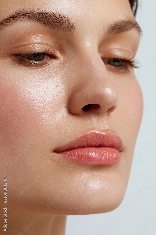 Fototapeta premium Close-up Face of Young Ethnic Woman with Natural Fresh Glowing Skin