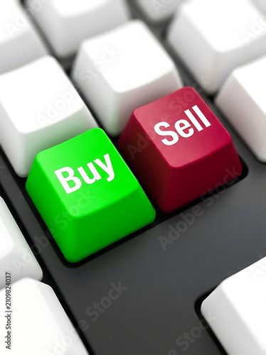 Green buy and red sell keys on a keyboard with selective focus during business concept
