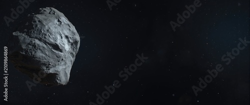 Photos Asteroid Floating in Outer Space with Stars in the Background
