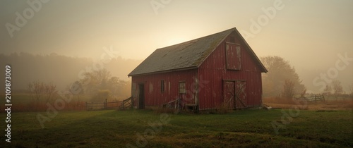 Red Barn in Misty Landscape...
