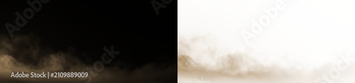 Fotografía Brown smoke rises on a transparent background during a late afternoon breeze at