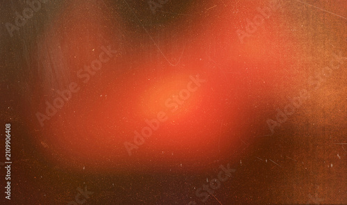 Abstract Halloween glow with soft orange light and subtle dust textures during a spooky night