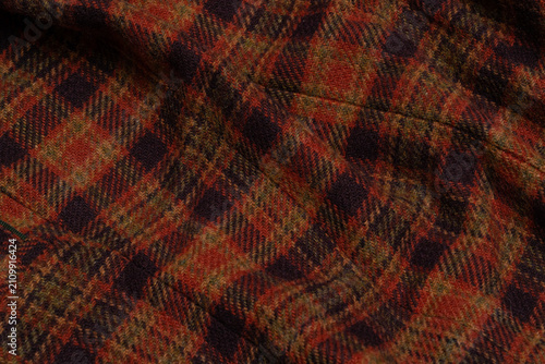 Red plaid wool fabric texture background