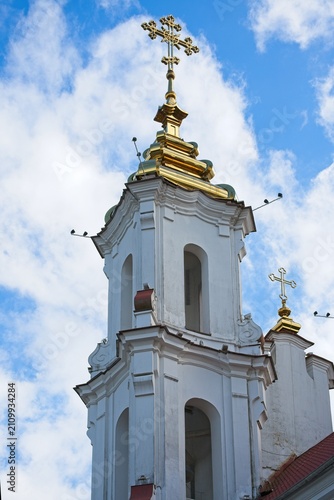 Vitebsk, Belarus, July 8, 2026. Fragment of the tower of the Resurrection Church with a cross.                               
