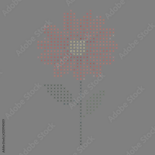 A stylized cross-stitch illustration of a flower composed of small X-shaped stitches. The flower head is primarily coral and red with a warm yellow center, while the stem and leaves use muted green an