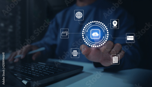 Business professional controls secure cloud services across connected devices, illustrating cybersecurity, data protection, identity access, payment security, mobile networks, and digital privacy.